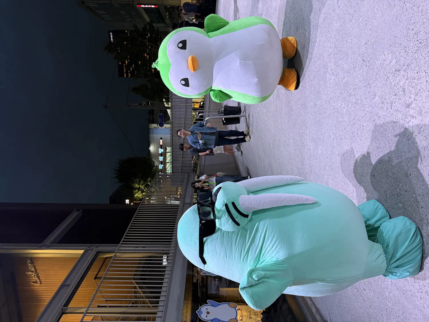 Pudgy Penguins summer event floor — merch handout 1