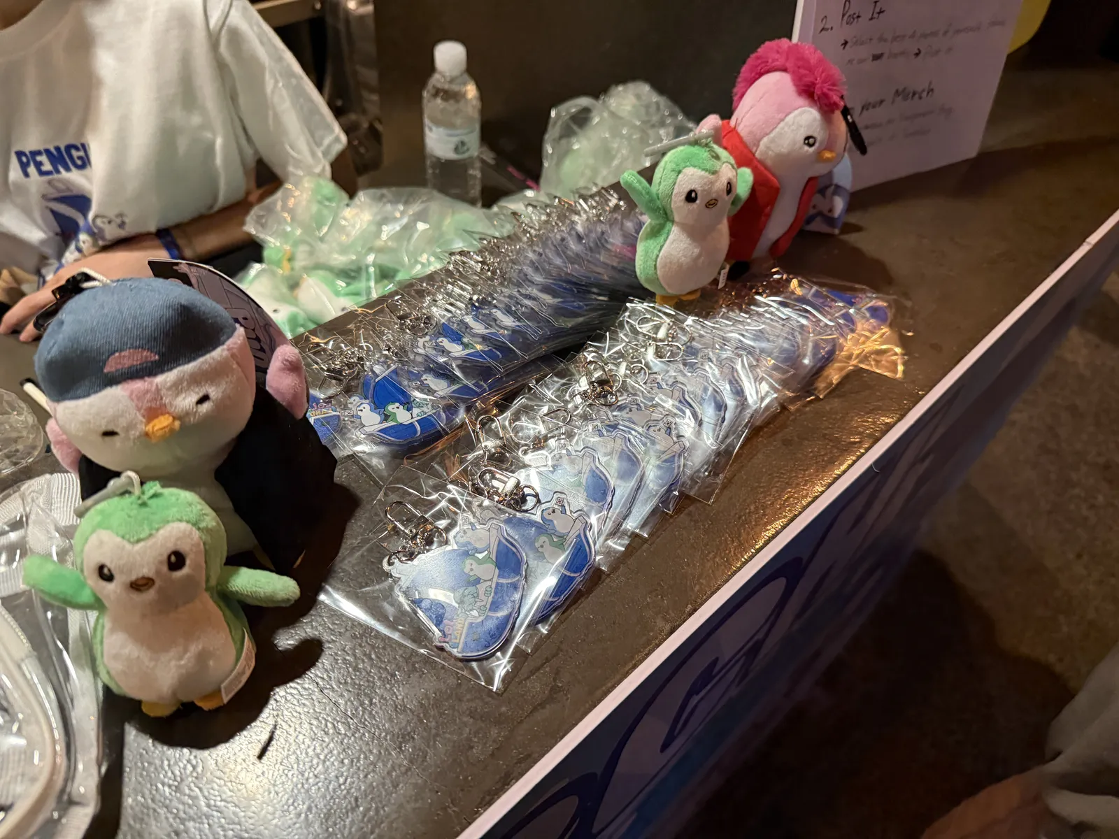 Pudgy Penguins summer event floor — merch handout 4